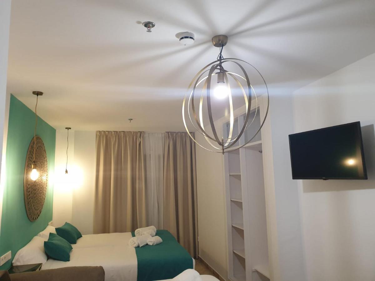 Apartamentos Dona Lola Севилья Экстерьер фото
