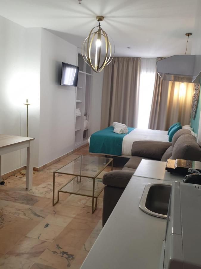 Apartamentos Dona Lola Севилья Экстерьер фото